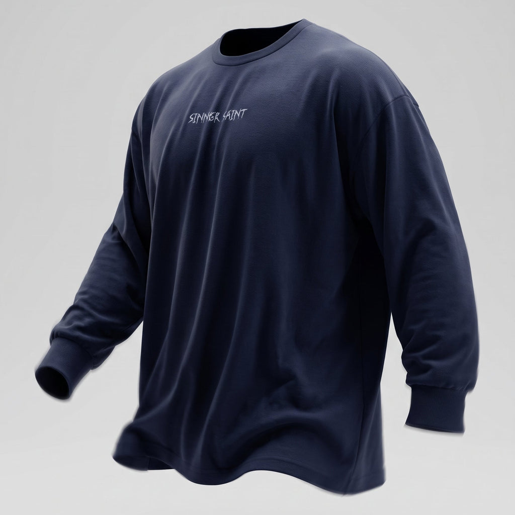 A navy blue oversized long sleeve tshirt in cotton with the text Sinner Saint och the chest