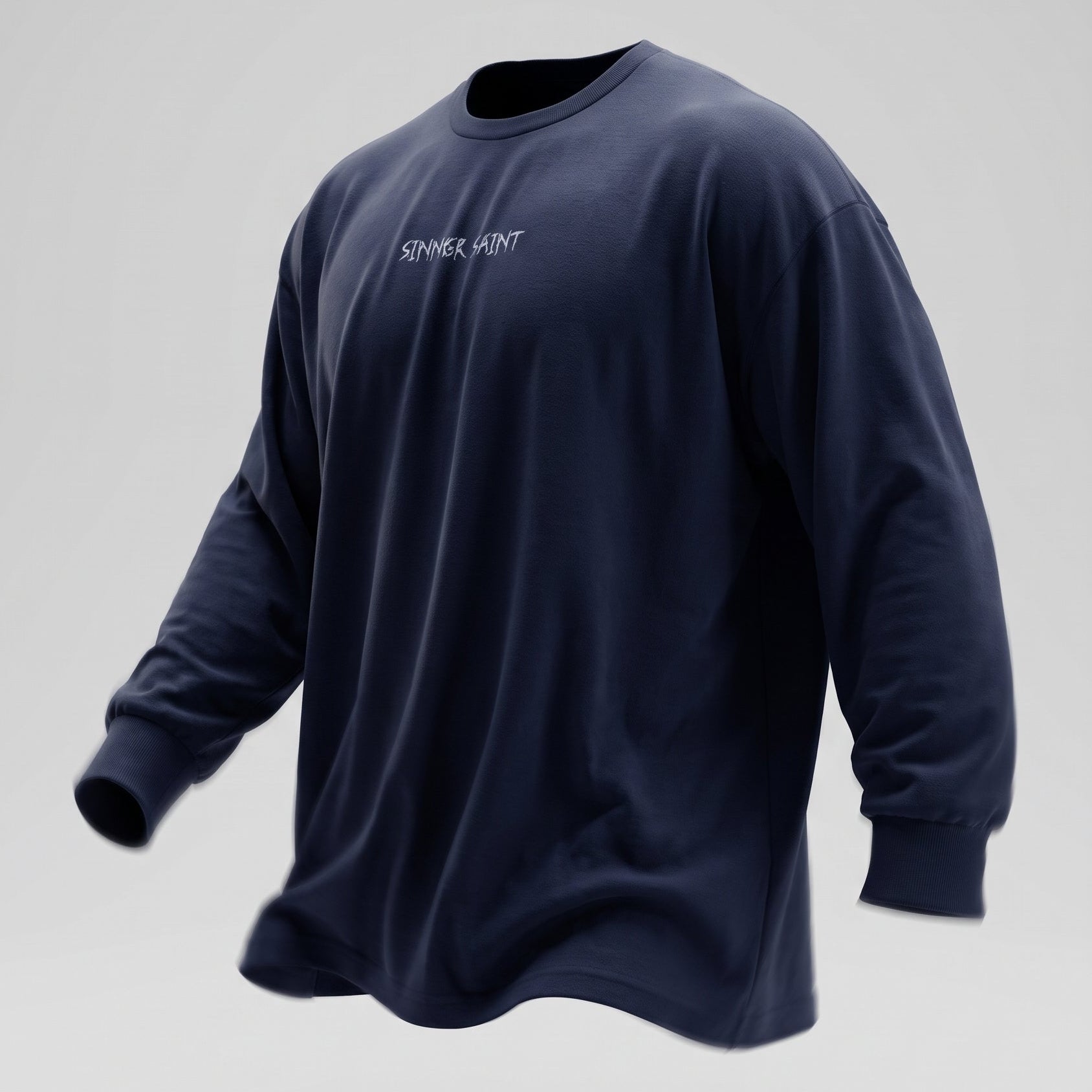 A navy blue oversized long sleeve tshirt in cotton with the text Sinner Saint och the chest