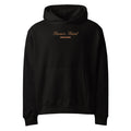 svart herr och dam oversized hoodie med framficka och huva med en orange text på bröstet där det står "Sinner Saint Bodybuilding".