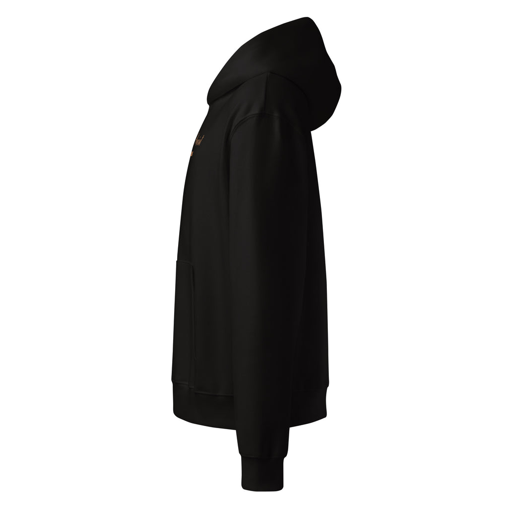 Svart oversized hoodie från sidan.